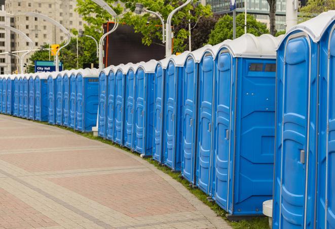 a row of portable restrooms at a fairground, offering visitors a clean and hassle-free experience in hendersonville
